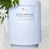 Il s'agit d'une bougie parfumée, faite à la main, artisanale Suisse à la senteur d'Edelweiss